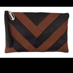 REDUCED 6/4 Brand new with tags attached Carlos Santana Clutch